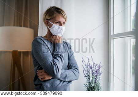 Woman Indoors At Home Feeling Stressed, Mental Health And Coronavirus Concept.