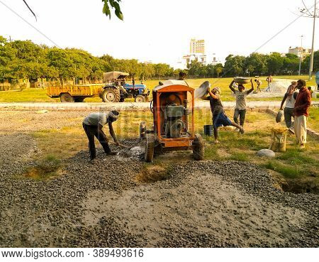 Utter Pardesh , India - Construction Worker Doing Work , A Picture Of Construction Worker Doing Work