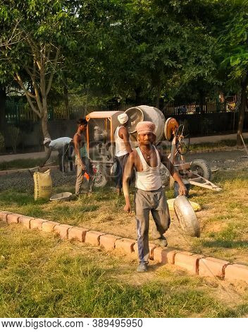 Utter Pardesh , India - Construction Worker Doing Work , A Picture Of Construction Worker Doing Work