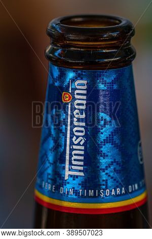 Romanian Timisoreana Beer Isolated, Close Up On Detail Of Glass Beer Bottle. Bucharest, Romania, 202