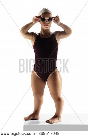 Professional. Beautiful Dwarf Woman Practicing In Swimming Isolated On White Background. Lifestyle O