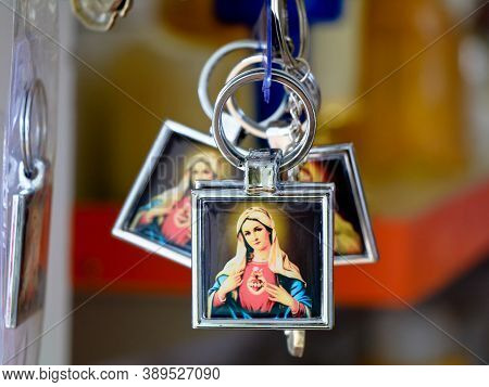Key Chains With Catholic Religious Symbols In A Pious Articles Shop