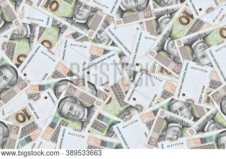 10 Croatian Kuna Bills Lies In Big Pile. Rich Life Conceptual Background