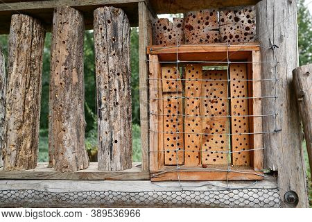 Close Up Of Insect House Hotel Structure Made Out Of Natural Wood Material Created To Provide Shelte