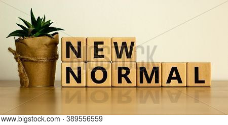Wooden Cubes With Words 'new Normal'. The World Is Changing To Balance It Into New Normal Include Bu
