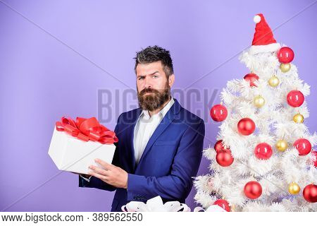 Serious Shoper. Winter Season Sales. Christmas Shopping. Bearded Man Presents From Santa. Successful