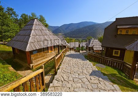 Traditional village Drvengrad Mecavnik in Serbia - architecture travel background