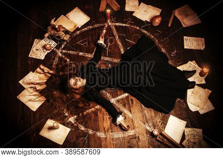A portrait of a scary witch in the wooden house. Magic, dark force, spell. 