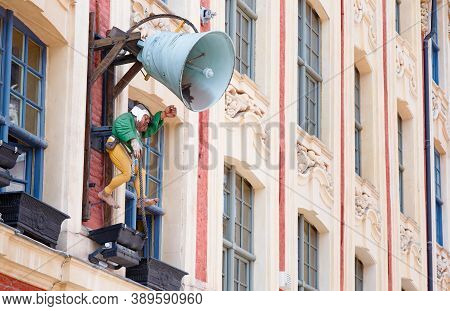 Lille, France - July 20, 2013. Bell Ringer Storefront Sign Outside Restaurant La Cloche, Historic Li