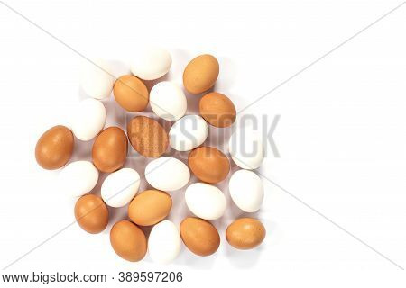 Many Brown Chicken Eggs In A Row Isolated Against A White Background. White, Brown, Beige Chicken Eg