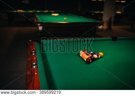 Billiard Table With Green Surface And Balls In The Billiard Club.pool Game
