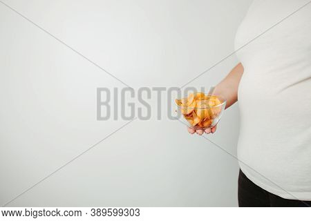 Processed Food, Unhealthy Diet, Imbalanced Ration. Overweight Woman Eating Salted Fattening Potato C