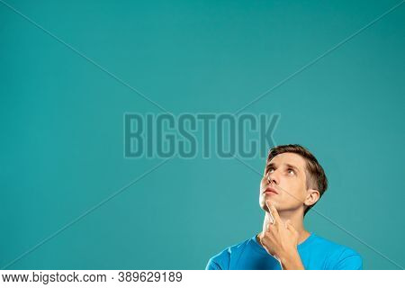 Doubtful Man. Make Decision. Information Banner. Create Plans. Puzzled Guy Looking Up Holding Chin H