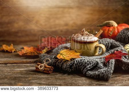 Autumn Concept, Still Life Of Pumpkin Latte With Whipped Milk Cream And Cinamon. Colorful Pumpkins A