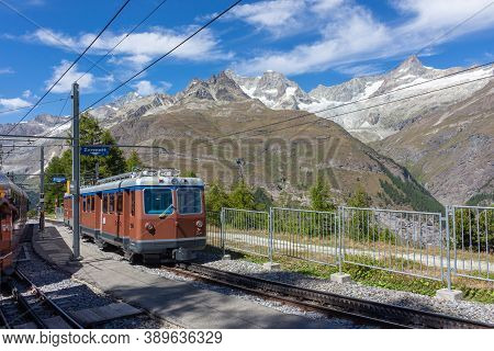 The Mountain Train From Zermatt Up To Gornergrat. The Gornergrat Bahn. Summer In The Swiss Alps. Swi