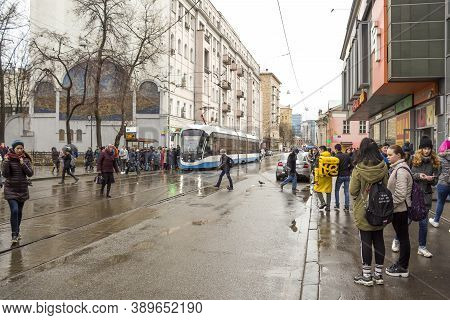 Russia, Moscow, March 22, 2019: Baumanskaya Metro Station, Baumanskaya Street, Tram, Tram Stop, Crow