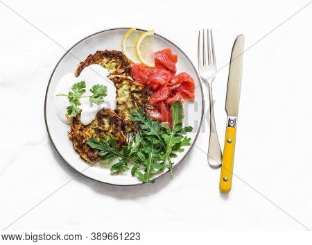 Zucchini And Latkes With Smoked Salmon, Sour Cream And Arugula. Delicious Breakfast, Brunch, Tapas, 