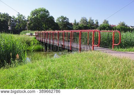 New Iron Bridge Over A Small River