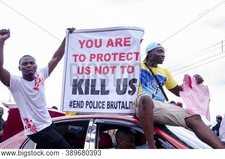 Lagos, Nigeria - October 12, 2020: Group Of Nigerian Youths Protesting Around The City About End Sar
