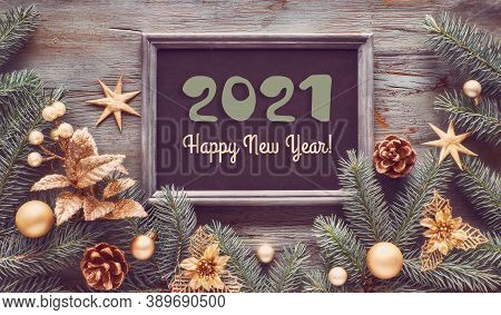 Decorated Fir Twigs Around Chalk Board On Rustic Wood, To View, Text Space
