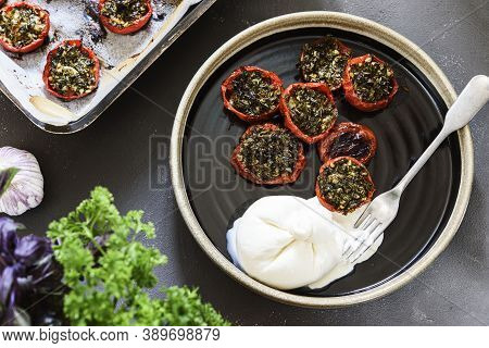 Provencal Tomatoes. Baked Tomatoes With Parsley, Garlic And Olive Oil Served With Burrata Cheese
