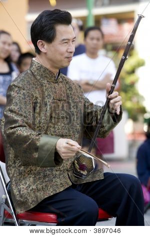 Erhu afspiller