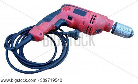 Old Red And Black Electric Drill On White Background