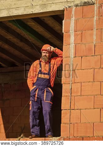 Regular Day. Daily Routine At Construction. Well Done. Repairman Tired Builder Relaxing At Construct