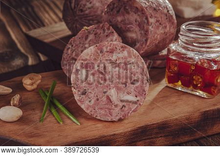 Slices Of White Pudding On Cutting Board