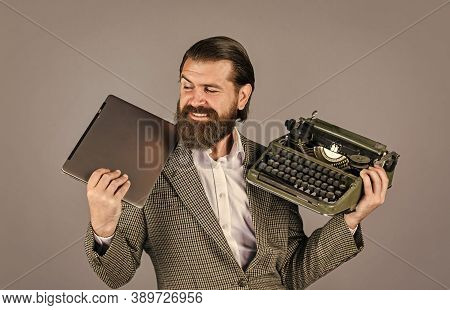 Happy Smile. Successful Businessman Use Retro Typewriter And Computer. Mature Man Hold Vintage Devic