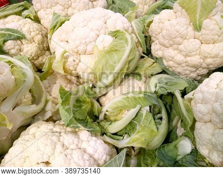 Fresh Cauliflower On The Counter Of The Vegetable Market