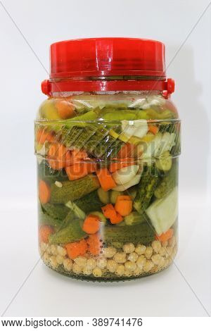 Turkish Tursu Pickled Vegetables In Jar Isolated On White Background.