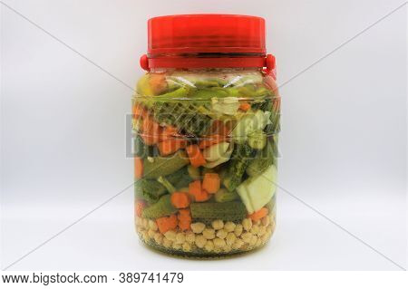 Turkish Tursu Pickled Vegetables In Jar Isolated On White Background.