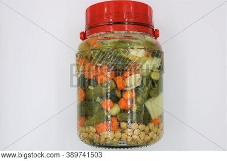 Turkish Tursu Pickled Vegetables In Jar Isolated On White Background.