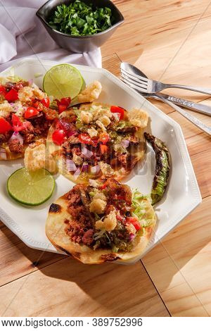 Mexican Longaniza Sausage And Steak Street Tacos Campechanos With Chicharron Pork Rinds And Tomatill