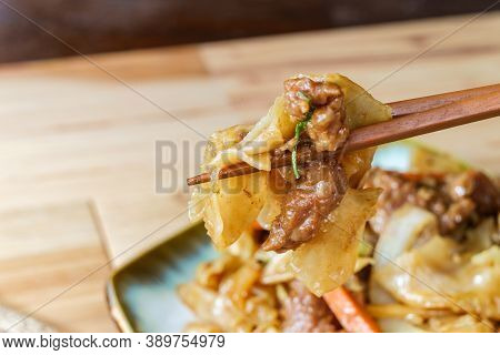 Stir Fried Chinese Beef Chow Fun With Hor Fun Wide Rice Noodles Cabbage And Carrots