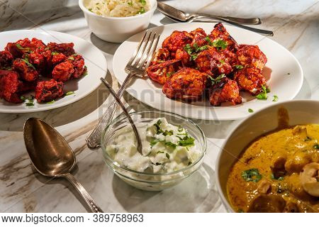 Indian Dinner Korma With Mushroom 65 Tandoori Cauliflower Rice And Raita