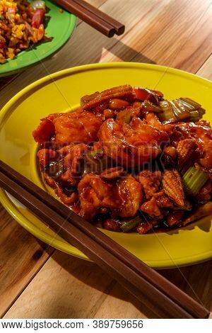 Takeout Chinese Kung Pao Chicken And Shrimp With Peanuts And Side Of Pork Fried Rice