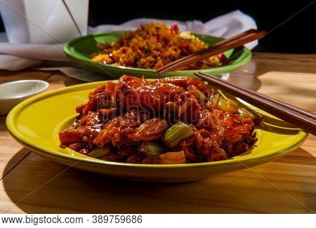 Takeout Chinese Kung Pao Chicken And Shrimp With Peanuts And Side Of Pork Fried Rice