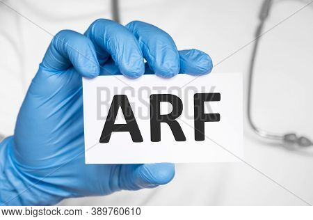 Doctor Holding A Card With Text Arf Acute Renal Kidney Failure, Medical Concept