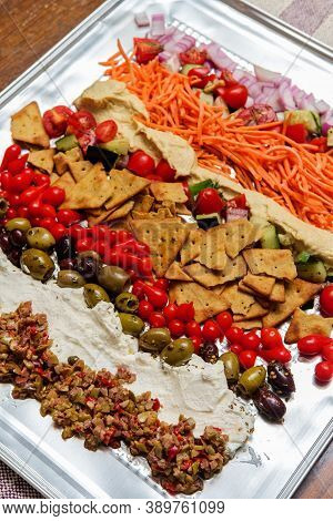 Greek Olive Hummus Platter With Sweety Drop Miniature Peppers And Pita Chips