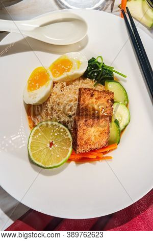 Thai Vegetarian Red Curry Rice Noodle Soup With Crispy Fried Tofu And Soft Boiled Egg