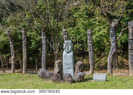 Chilgapsan, South Korea; October 2, 2020: For Editorial Use Only. Concrete Korean Totem Pole In Lawn