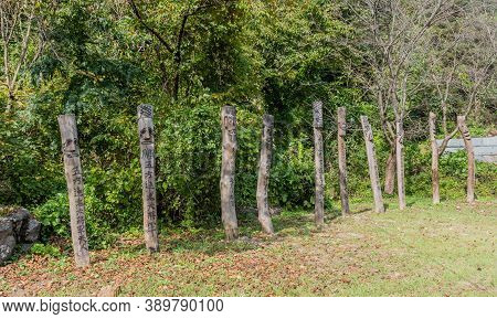 Chilgapsan, South Korea; October 2, 2020: For Editorial Use Only. Row Of Korean Totem Poles At Edge 