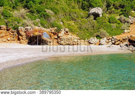 Sea And Sandy Vlychada Beach At Sunny Day. Tranquil Scene. Dyllic Relaxation Place In Greece.
