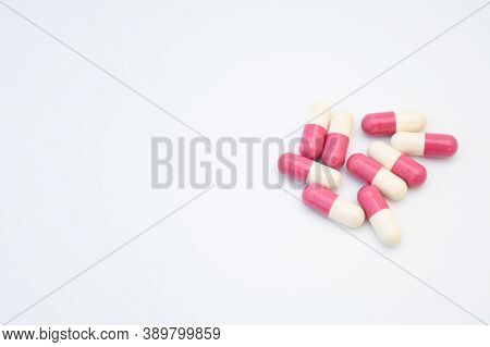 Medicine Pink Pills In Tablet And Capsul On White Background With Space For Text. Medicine For Heal 