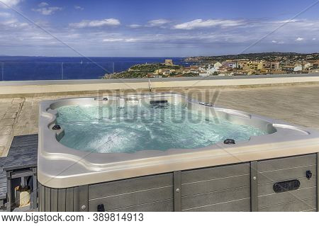 Modern Luxurious Pool With Hydromassage Overlooking The Town Of Santa Teresa Gallura, Located On The
