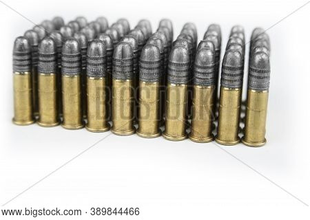 The Rimfire Cartridges On A White Background