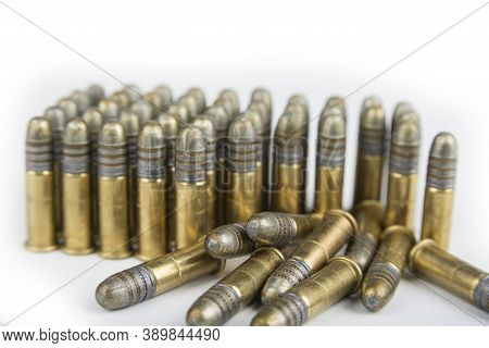 The Rimfire Cartridges On A White Background