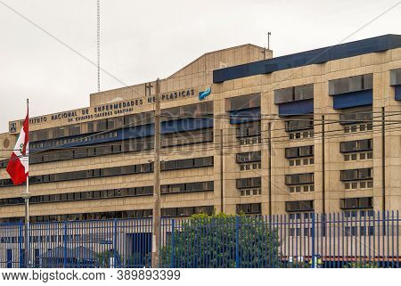 Lima, Peru - December 4, 2008: Yellow Facade Of The Cancer Hospital Called Intituto Nacional De Enfe